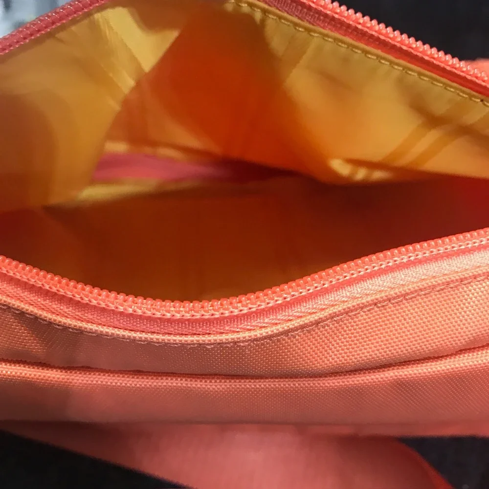 Tumi Model 4892MLN Voyageur Tangerine Nylon Weekender Travel Shoulder Duffel Bag